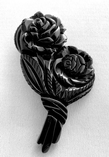 BP190 black bakelite rose pin